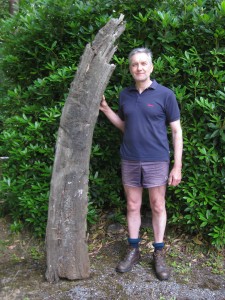 Trevor holds one of the railway sleepers which was a part of the brick works.