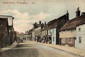Post card of Peach Street Wokingham which includes 52 Peach Street (blue house) Photo from the Goatley Collection